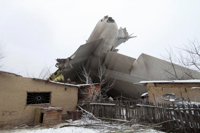 Plane debris is seen at the crash site of a Turkish cargo jet near Kyrgyzstan's Manas airport outside Bishkek, January 16, 2017. REUTERS/Vladimir Pirogov